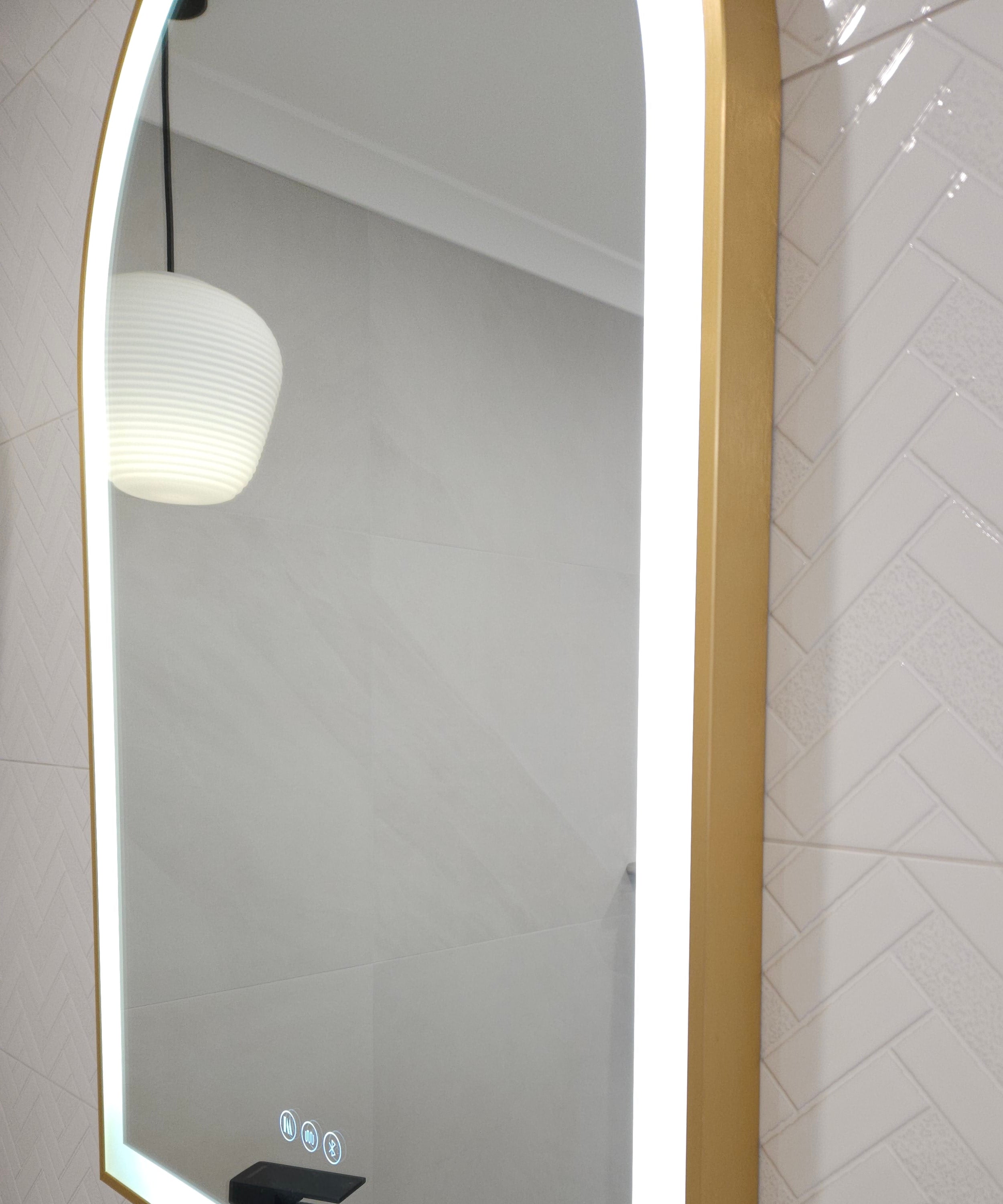 Side Angle of Gold-Framed Arch-Shaped InVogue Mirror