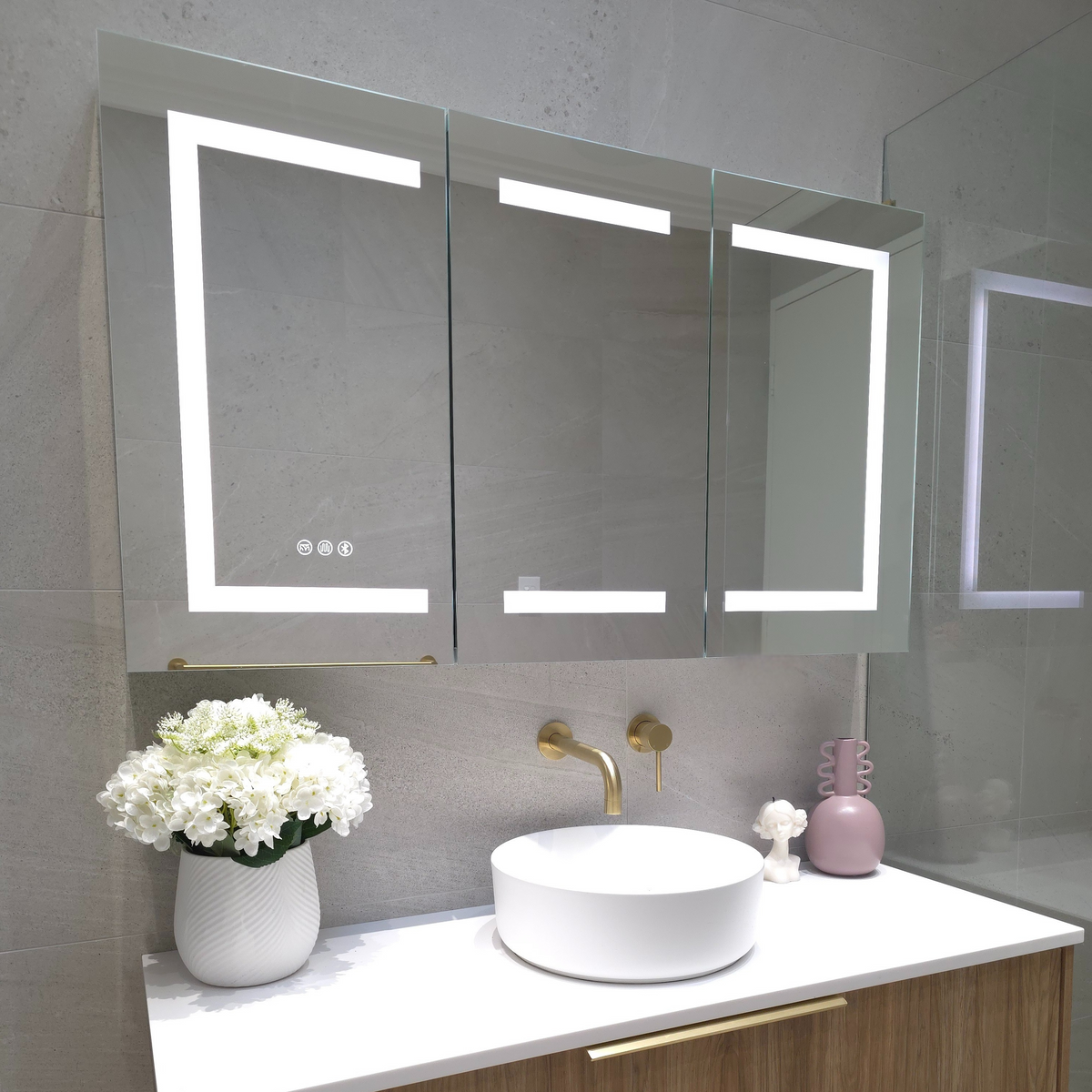 Angled view of Rectangle frameless LED bathroom cabinet by Invogue