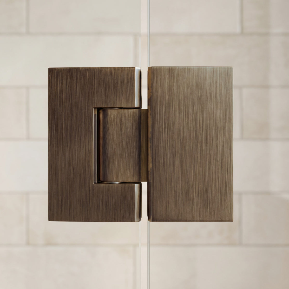 Geneva Shower Hinge Glass to Glass in Antique Brass on a glass shower screen
