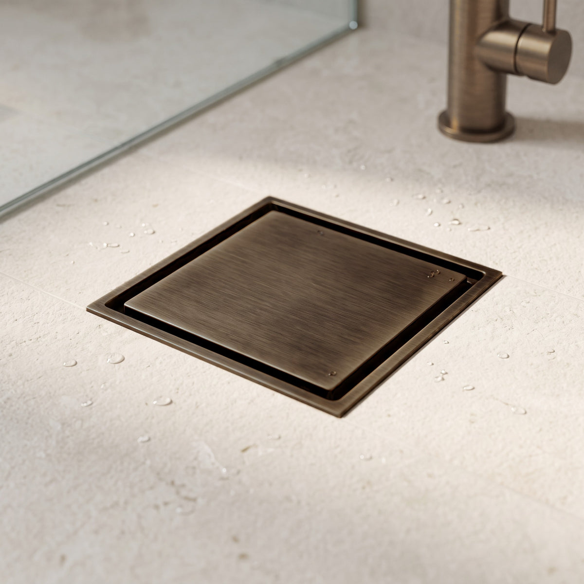Close-up of the Granada Tile Insert Floor Waste in Antique Brass