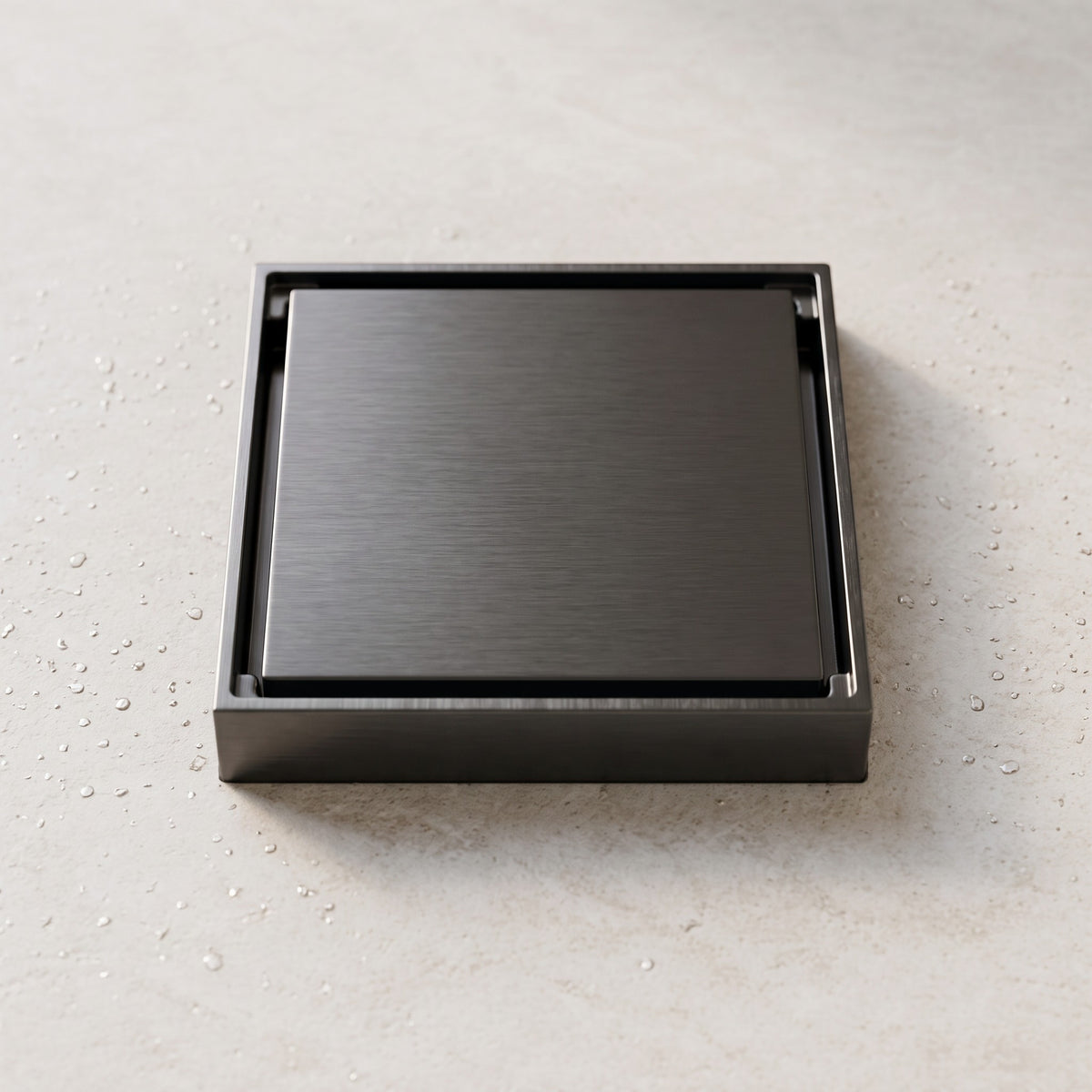 Close-up of the Granada Tile Insert Floor Waste in Brushed Gunmetal