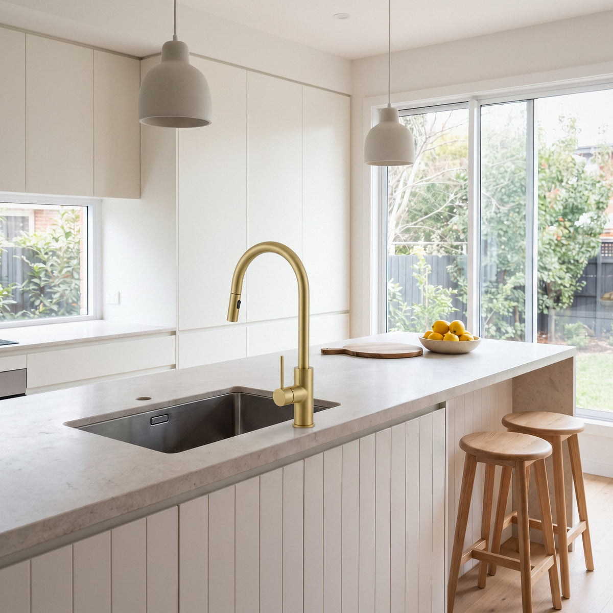 Porto Pull-Out Kitchen Mixer in Brushed Brass in a kitchen