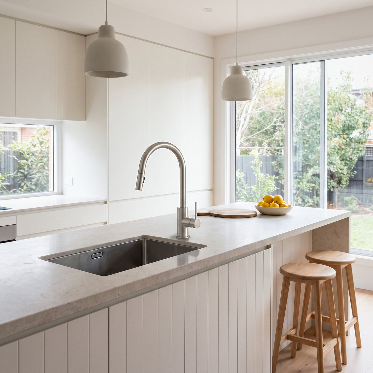 Porto Pull-Out Kitchen Mixer in Brushed Nickel in a kitchen