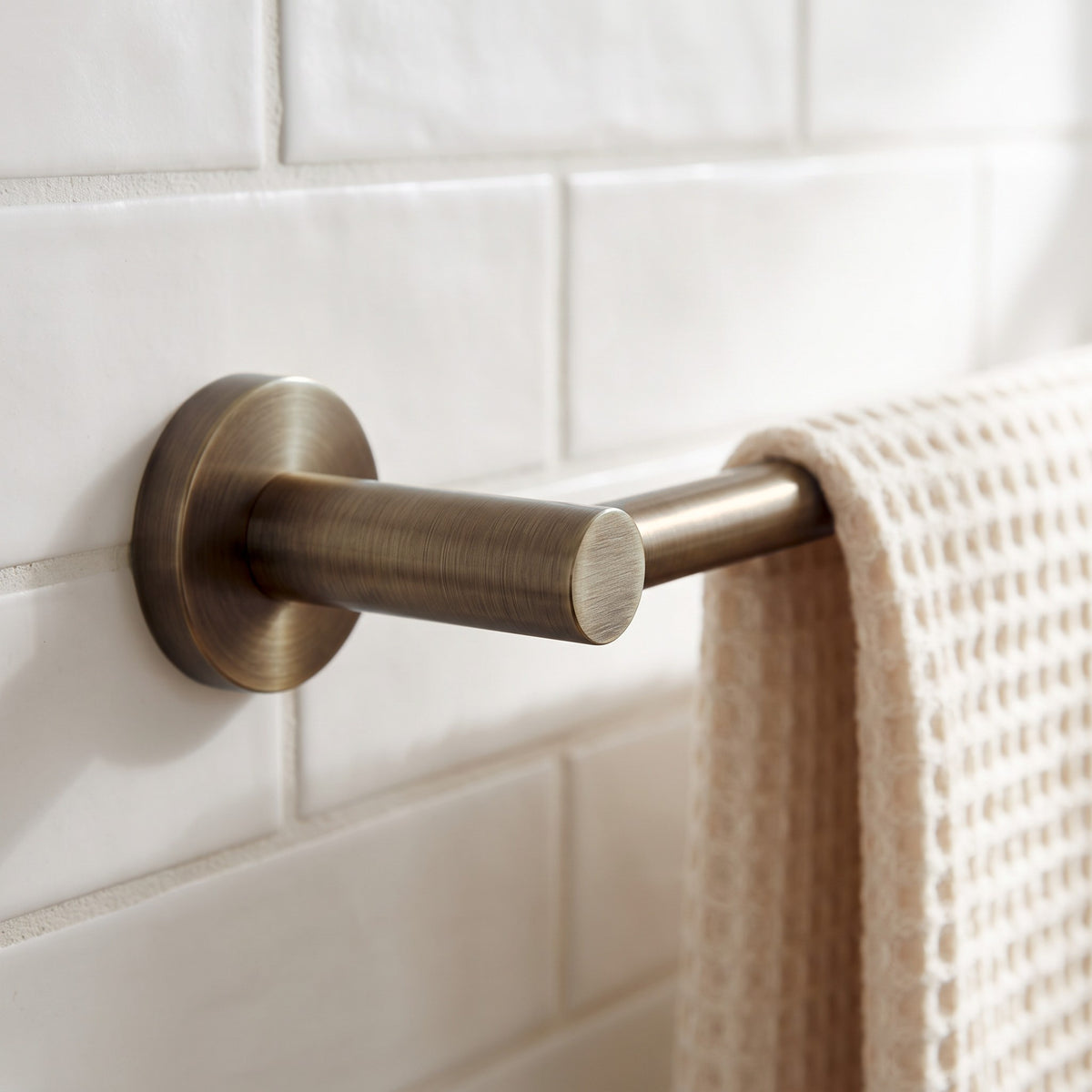 Close-up of the Provence 600mm Single Towel Rail in Antique Brass