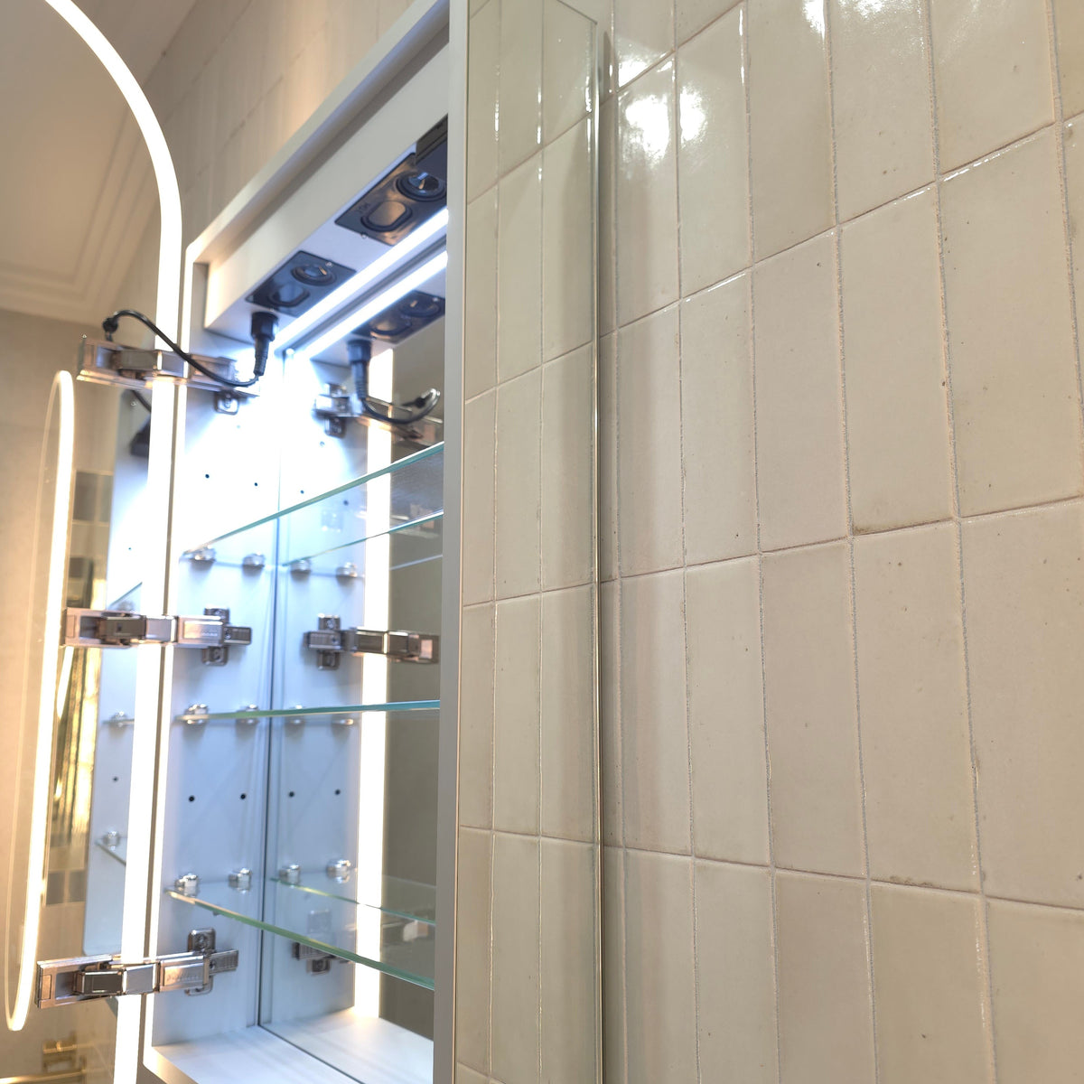 Side profile of Frameless LED oval mirror cabinet with adjustable internal storage and powerpoint