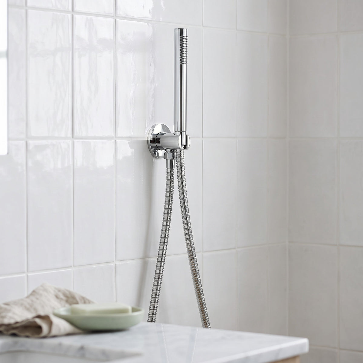 Close-up of the Versailles Handheld Shower Head with Hose in Chrome