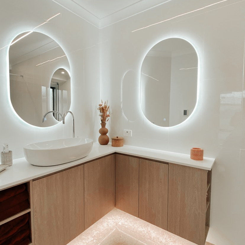 Corner Vanity with Dual Oval LED Mirrors, Floating Cabinet with Under-Lighting, and LED Lighting