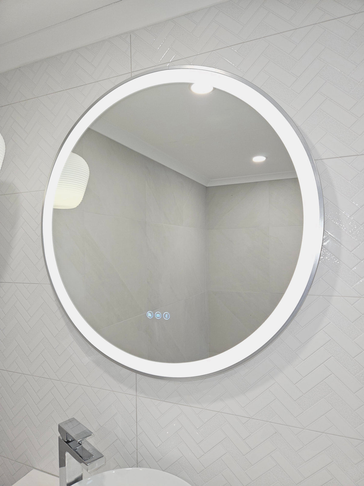 Silver Frame Circle Smart LED Mirror in White-on-White Powder Room