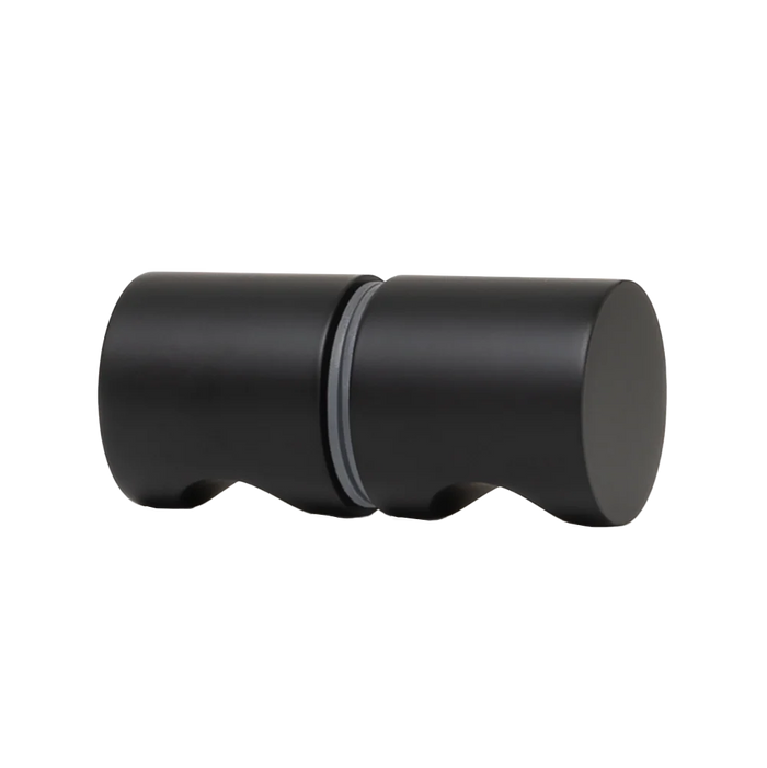 Corfu Shower Door Handle in Matte Black, side view of the back-to-back cylindrical knob pair with a grey washer