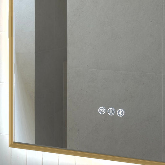 Close-up of the Calais mirror touch icons and flat-bottom corner, gold frame
