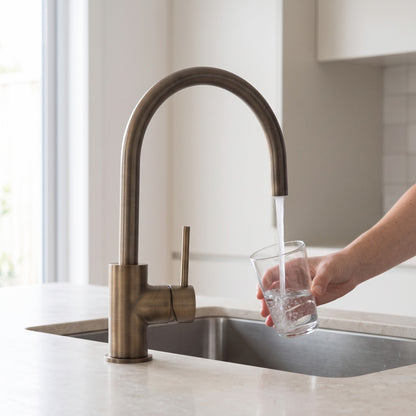 Como Kitchen Mixer Tap in Antique Brass in use in a kitchen