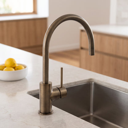 Como Kitchen Mixer Tap in Antique Brass in a kitchen