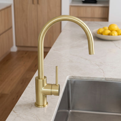 Como Kitchen Mixer Tap in Brushed Brass in a kitchen