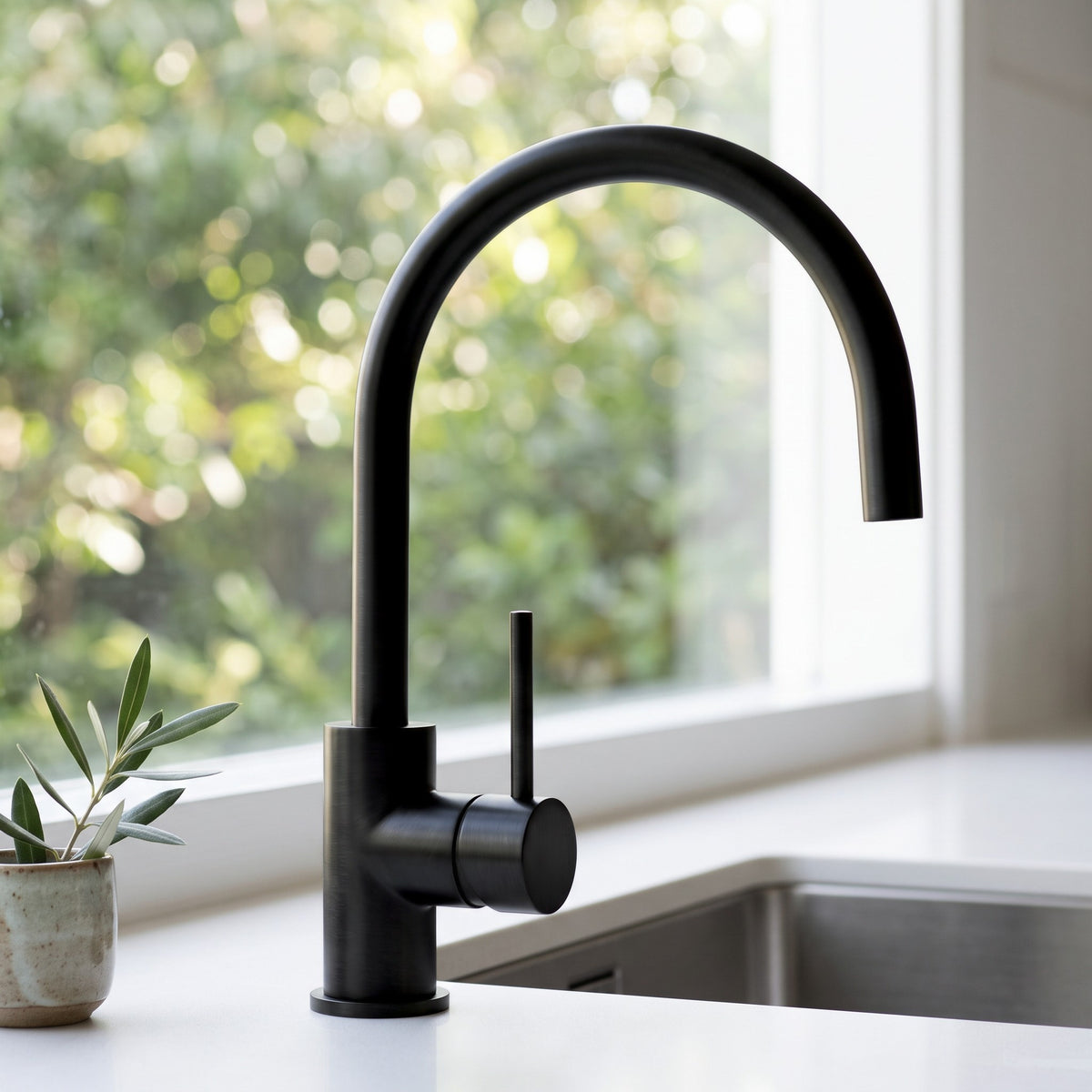 Close-up of the Como Kitchen Mixer Tap in Matte Black