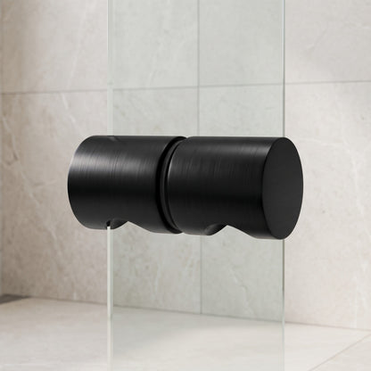 Corfu Shower Door Handle in Matte Black on a glass shower door