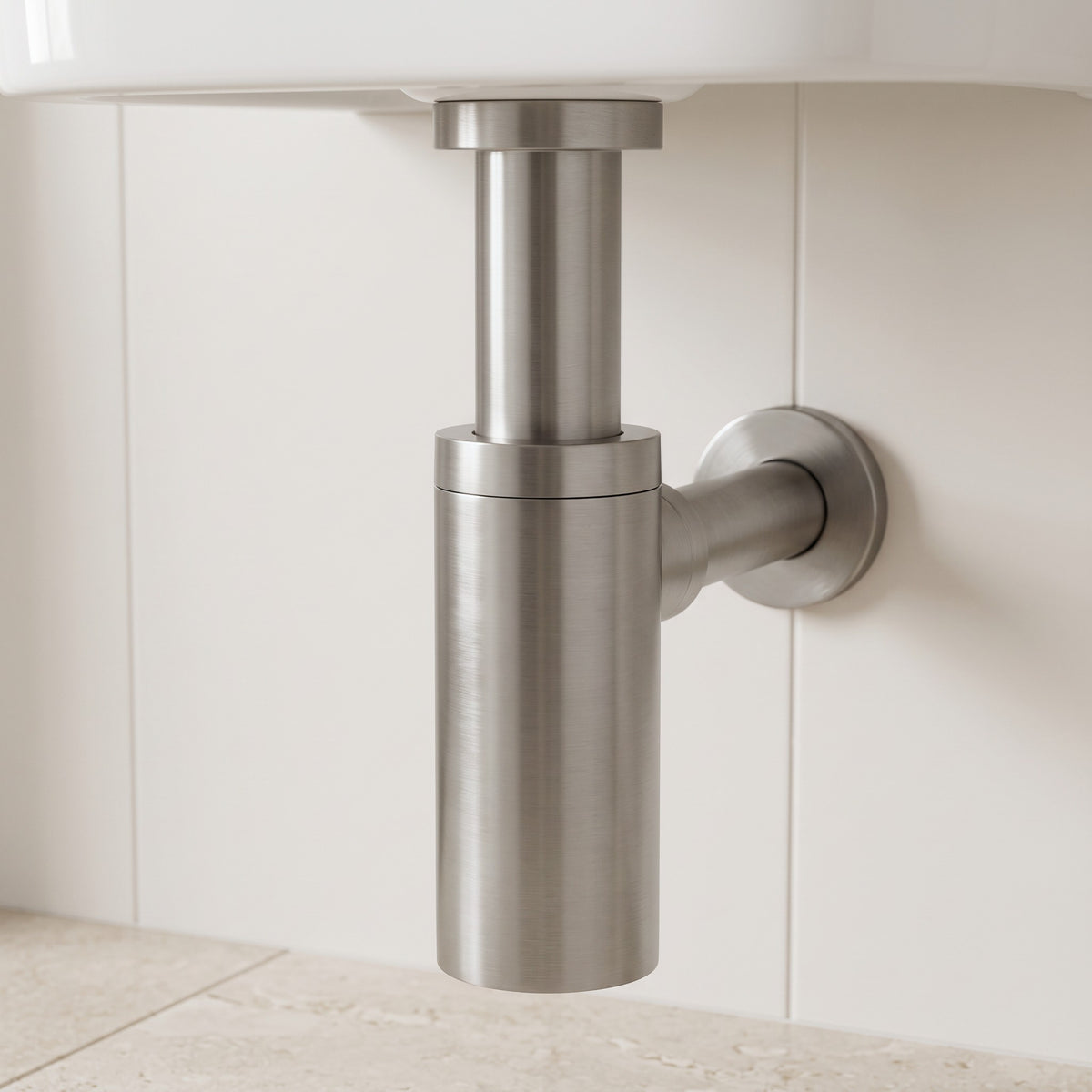 Firenze Basin Bottle Trap in Brushed Nickel in a bathroom