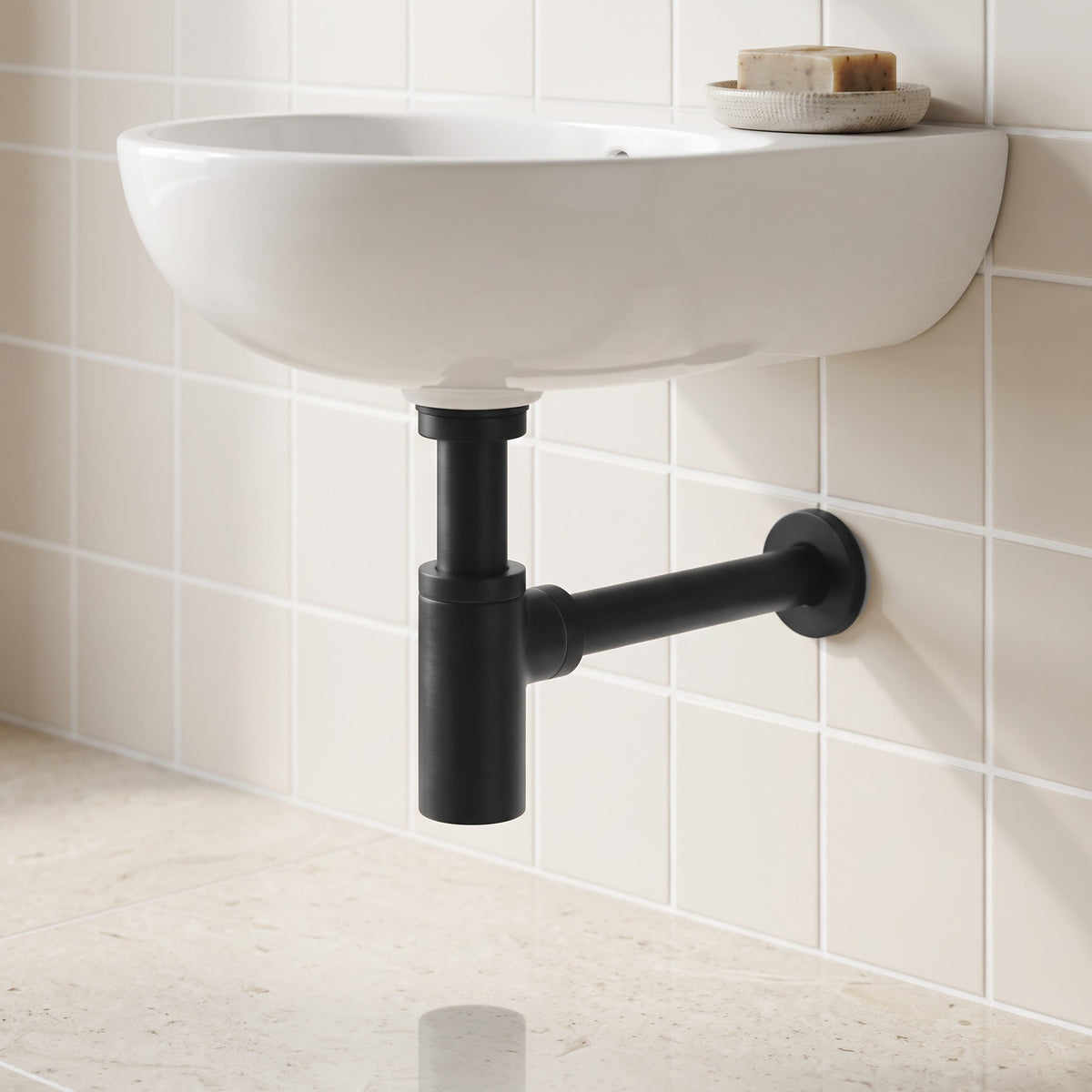 Firenze Basin Bottle Trap in Matte Black in a bathroom