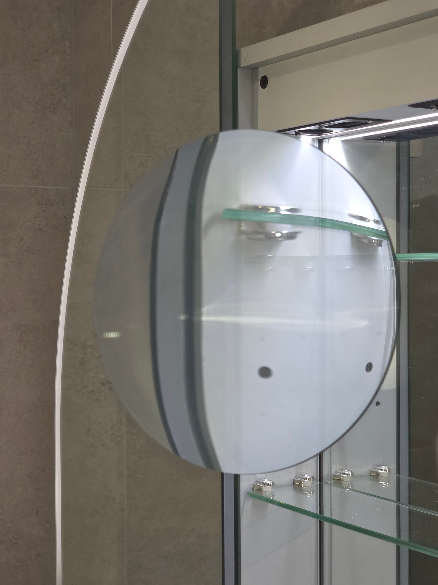 Inside view of frameless LED mirror cabinet with internal magnifier