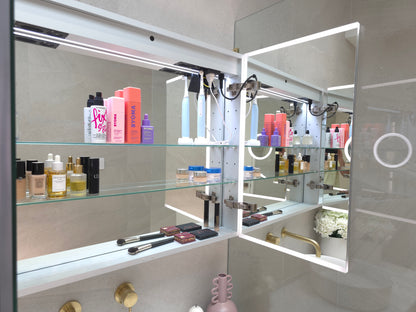 Inside view of frameless LED Smart mirror cabinet with internal storage shelves by Invogue