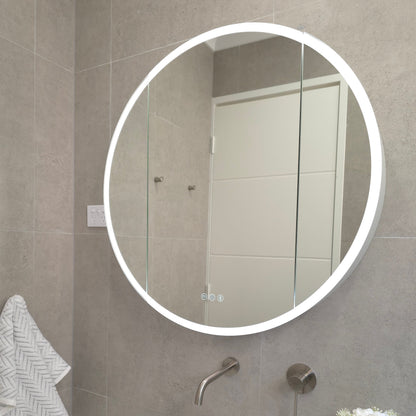 Exterior view of round LED mirror cabinet with built-in bluetooth speakers and sensor lighting