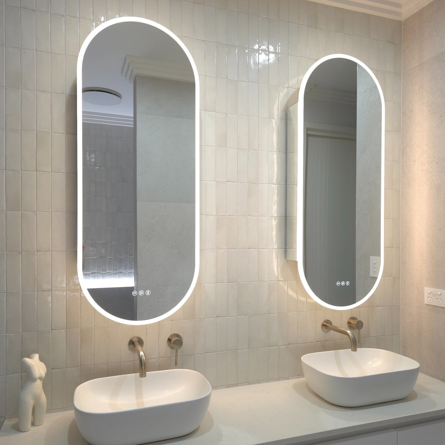 Frameless oval LED mirror cabinet with internal storage and adjustable shelves