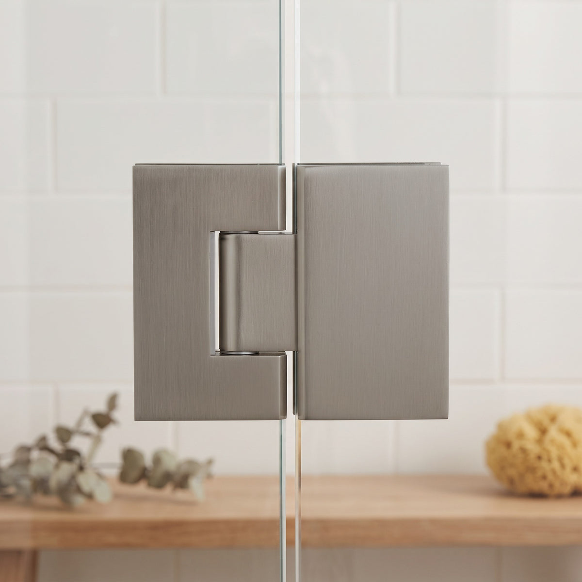 Geneva Shower Hinge Glass to Glass in Brushed Nickel on a glass shower screen