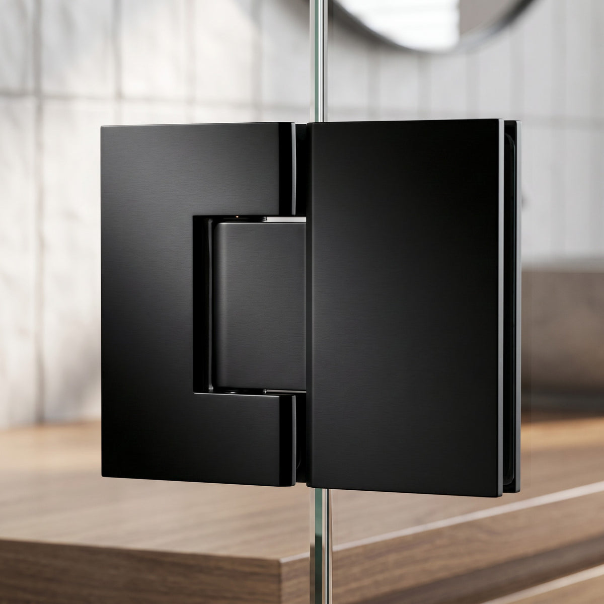 Close-up of the Geneva Shower Hinge Glass to Glass in Matte Black