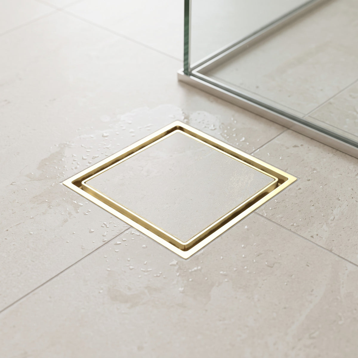 Granada Tile Insert Floor Waste in Brushed Brass in a shower