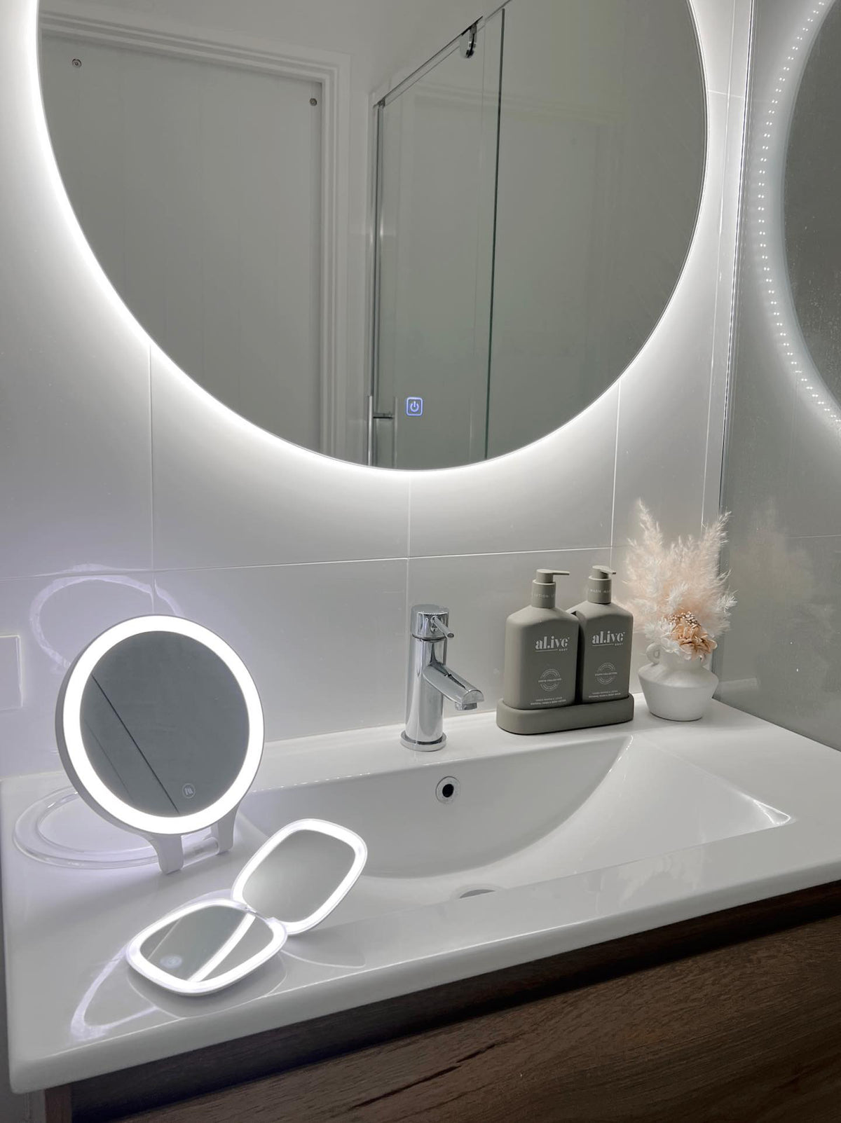 Chic White Bathroom with Circle Backlit Mirror, LED Mini Make-Up Mirror, and Small Circle LED Mirror
