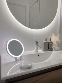 Circle Backlit Mirror on White Wall, LED Mini Make-Up Mirror, and Small Circle LED Mirror on Vanity