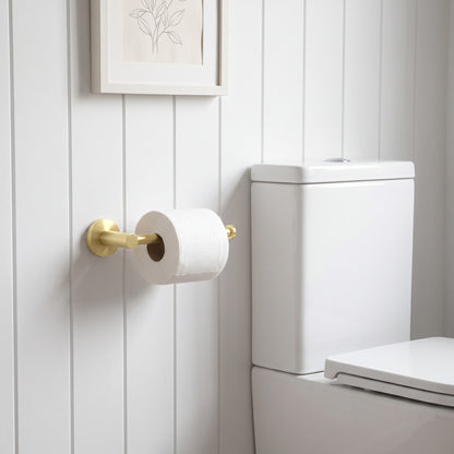 Lille Toilet Roll Holder in Brushed Brass in a bathroom