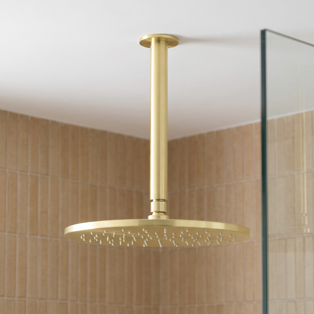 Lyon Ceiling Shower Arm and Head in Brushed Brass in a shower