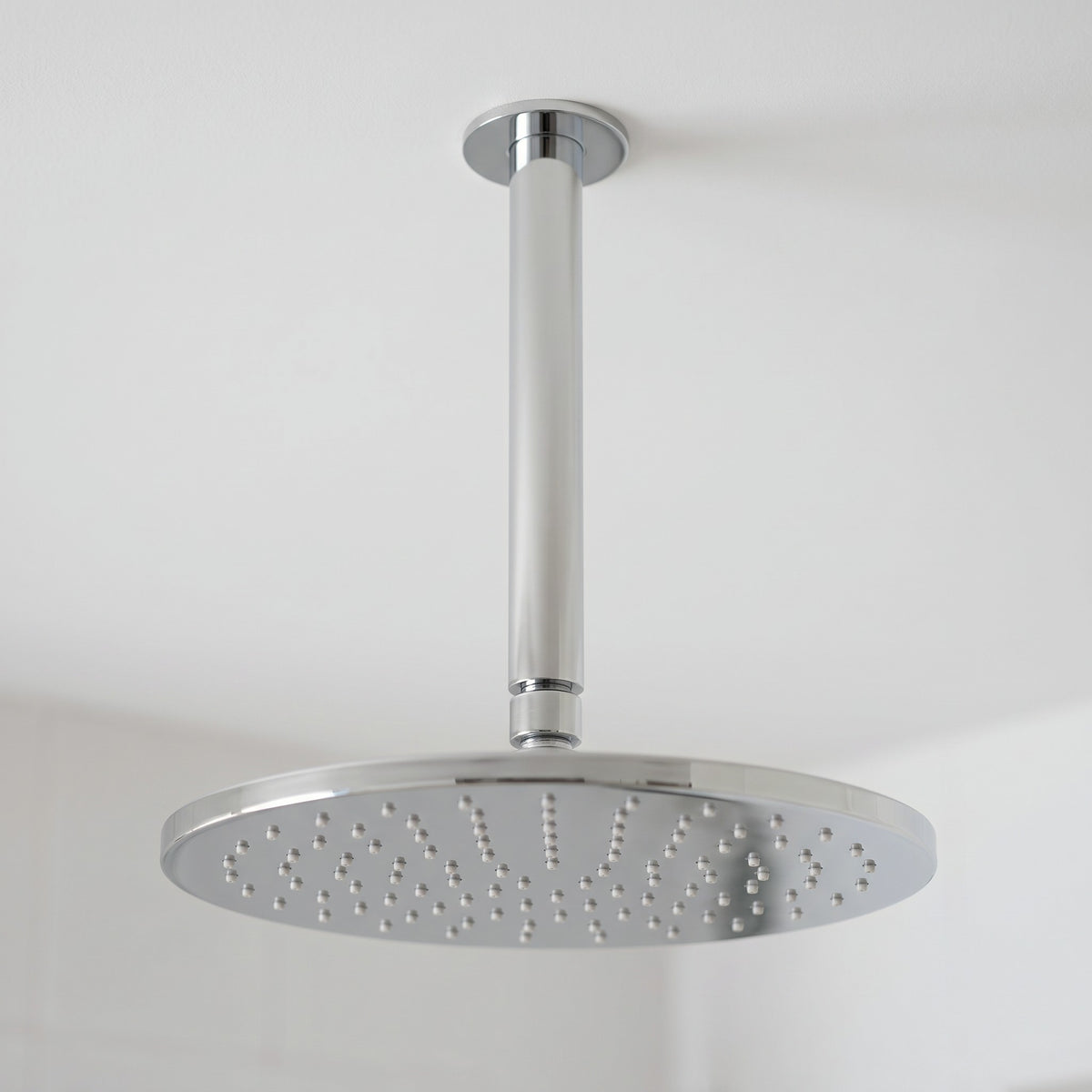 Close-up of the Lyon Ceiling Shower Arm and Head in Chrome