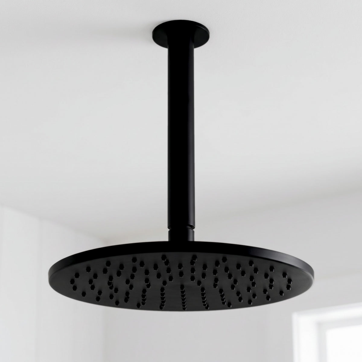 Close-up of the Lyon Ceiling Shower Arm and Head in Matte Black