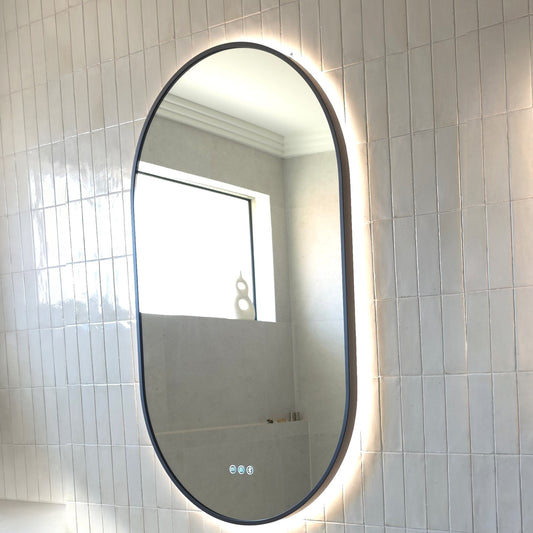 Angled view of the Marseille matte black frame showing how it wraps around the edge of the glass