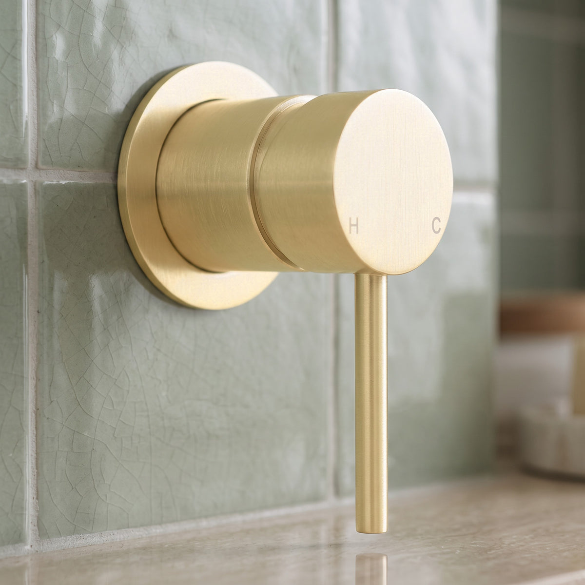 Close-up of the Milano Wall Mixer in Brushed Brass