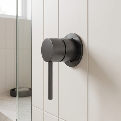 Milano Wall Mixer in Brushed Gunmetal in a bathroom