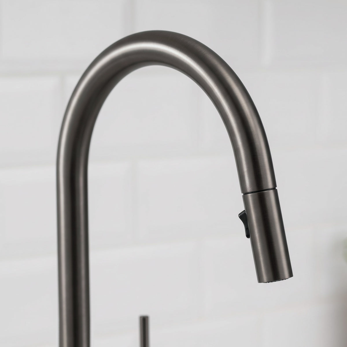 Close-up of the Porto Pull-Out Kitchen Mixer in Brushed Gunmetal