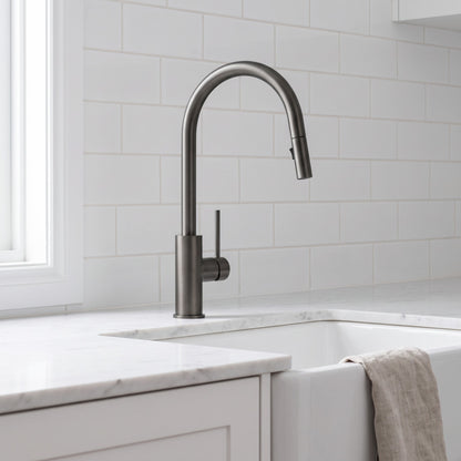 Porto Pull-Out Kitchen Mixer in Brushed Gunmetal in a kitchen