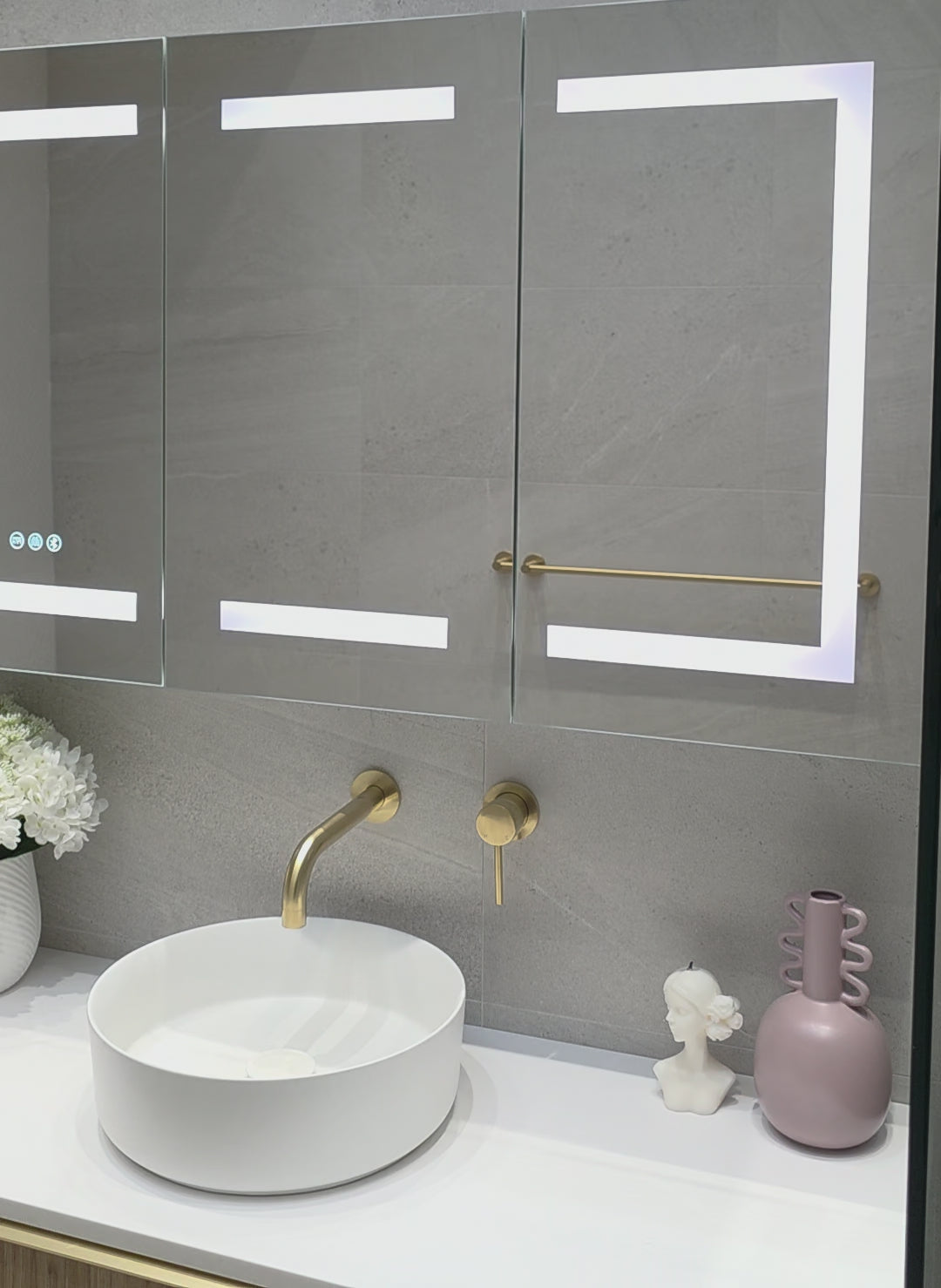 Video demonstration of close up of frameless LED bathroom mirror cabinet