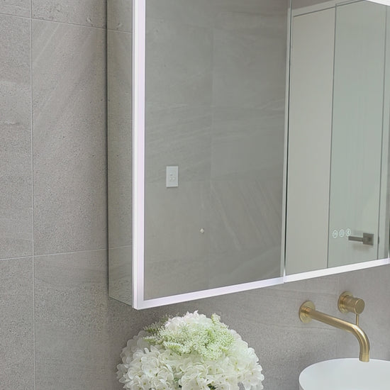 Video demonstration of the exterior lighting of frameless LED bathroom mirror cabinet by Invogue