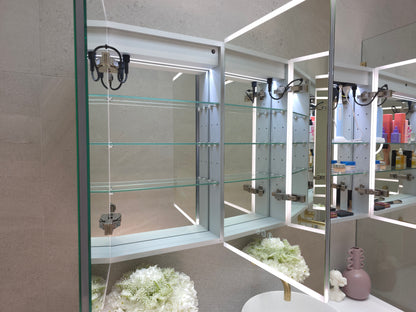 Frameless bathroom mirror cabinet showing fully mirrored interior