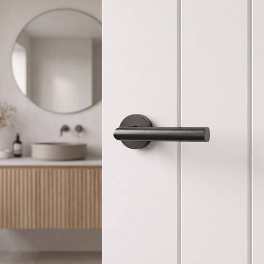 Close-up of the Santorini Door Handle in Brushed Gunmetal