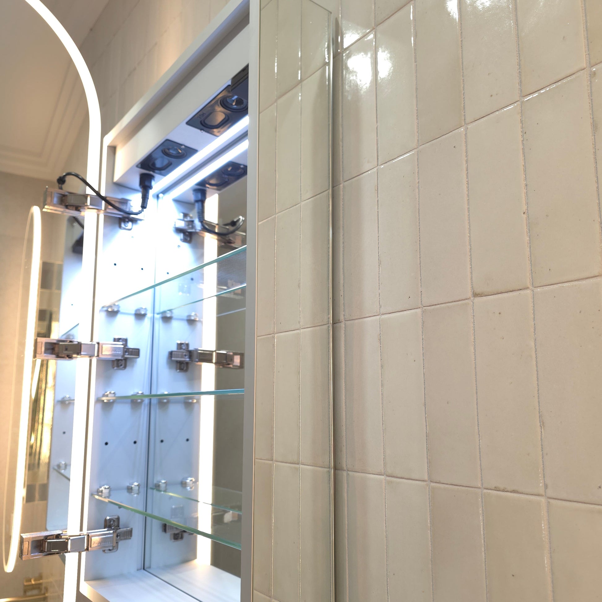 Side profile of Frameless LED oval mirror cabinet with adjustable internal storage and powerpoint