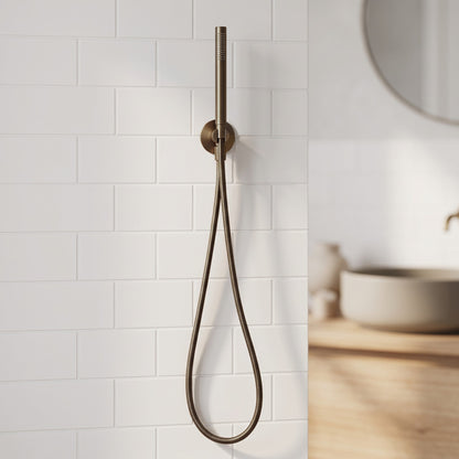 Close-up of the Versailles Handheld Shower Head with Hose in Antique Brass