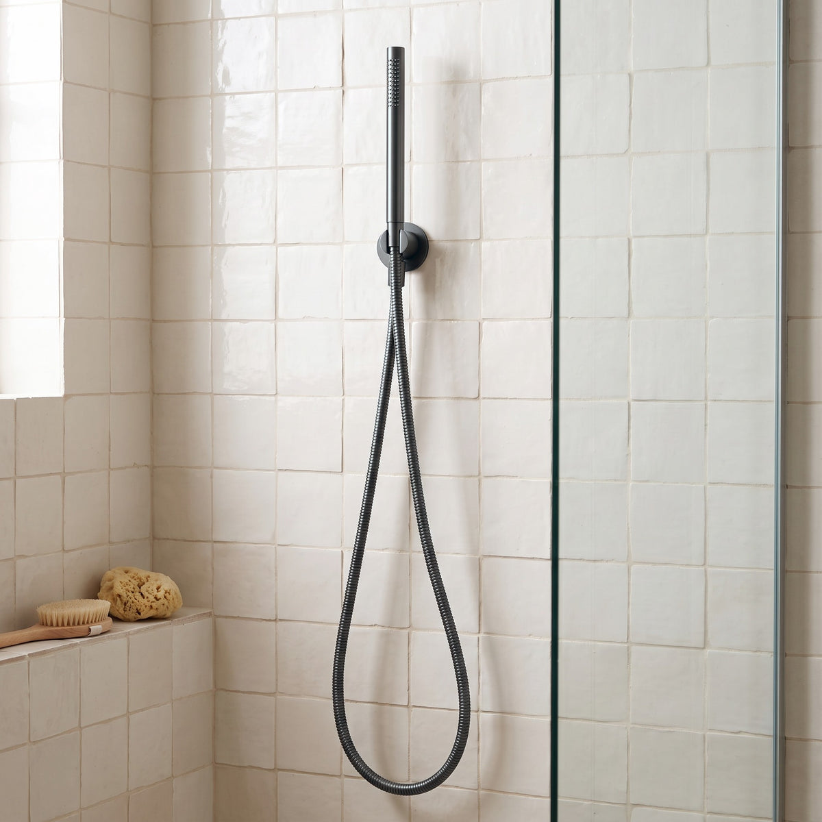 Versailles Handheld Shower Head with Hose in Chrome in a shower