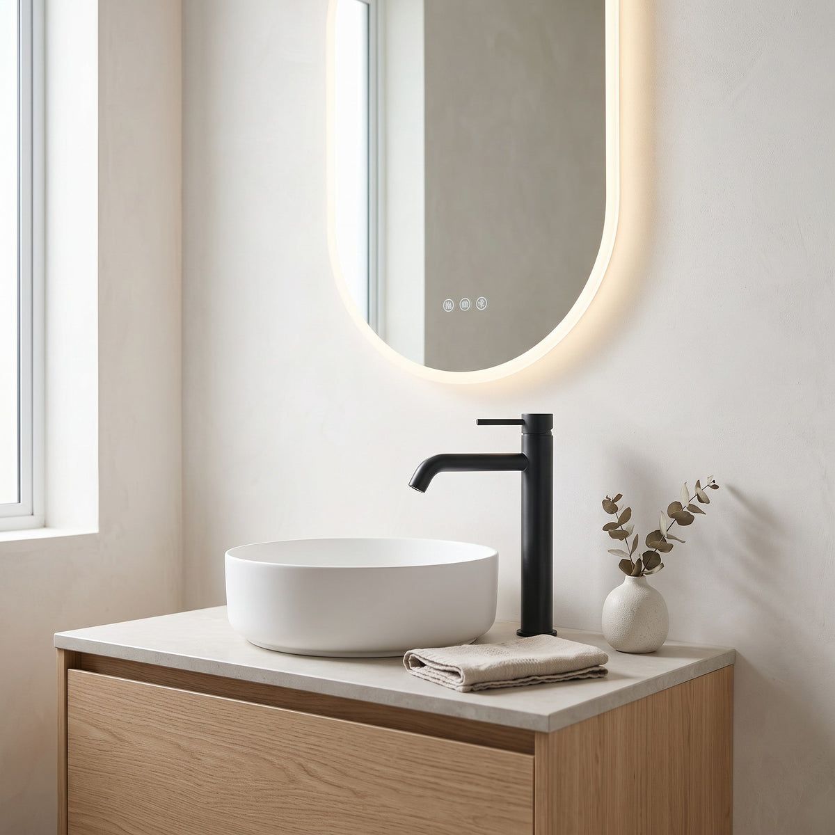 Vienna Tall Basin Mixer in Matte Black in a bathroom