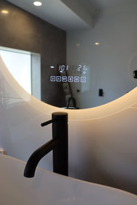 Close-Up of Oval Smart LED Mirror Control Panel: Yellow Light, White Wall, Black Faucet, Vessel Sink