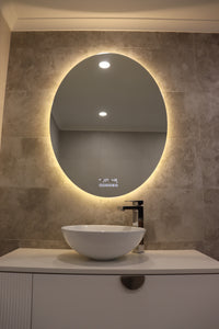 Illuminating Yellow Light: Oval Smart Backlit LED Mirror Brightens Bathroom sans Main Light