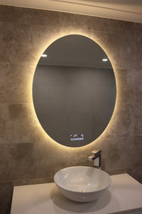  Yellow Light Emanating from the Oval Smart Backlit LED Mirror